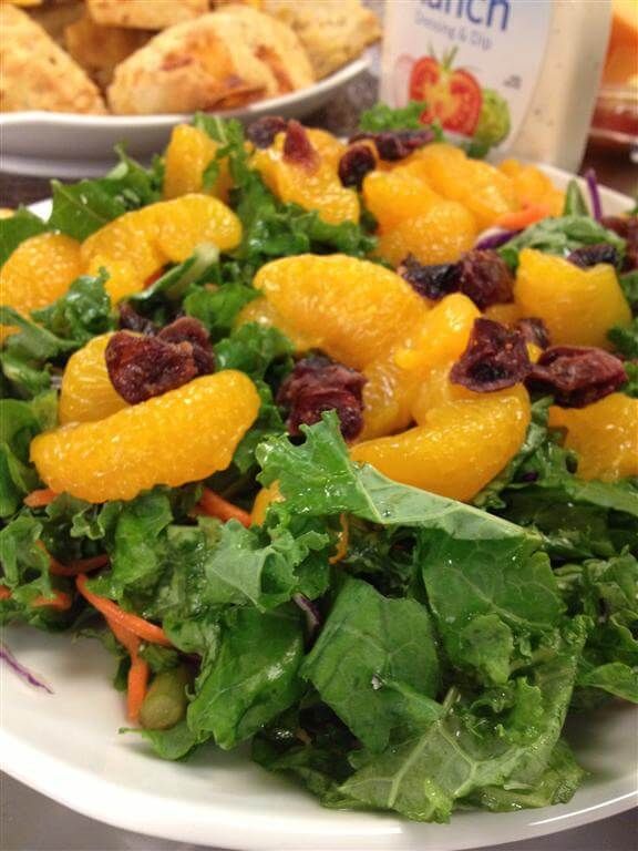 A plate of salad with mandarin oranges